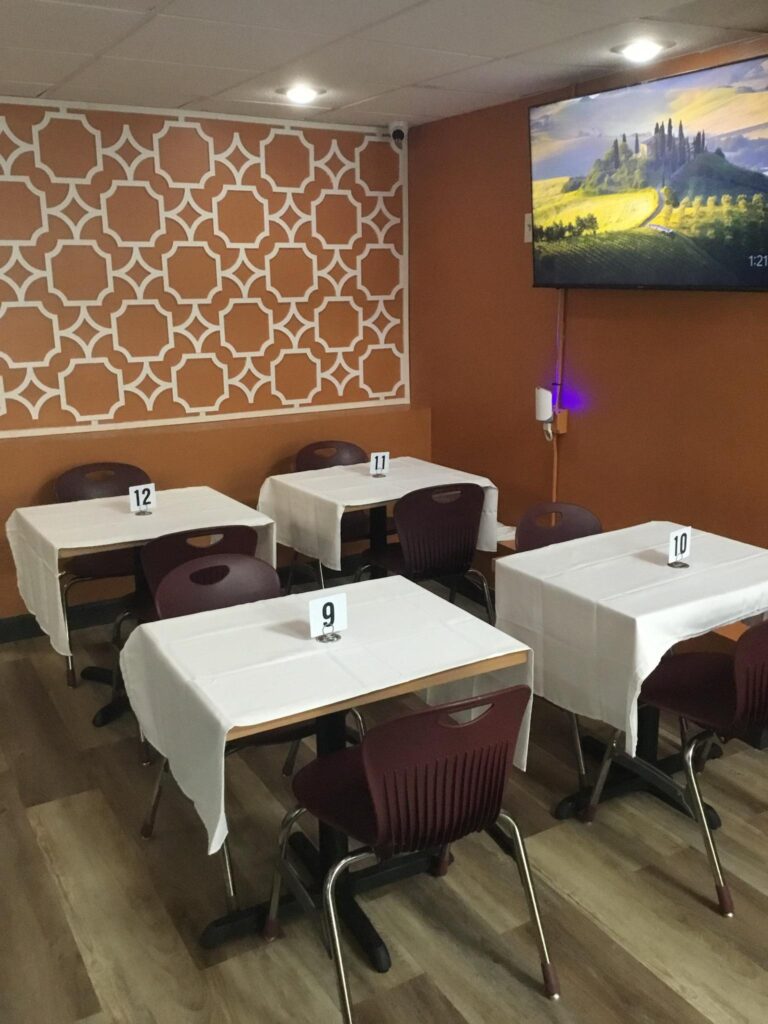 Comfort African Cuisine Lounge - tables with number 9 through 12